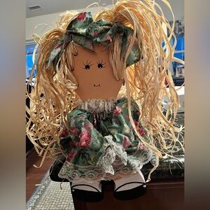 Antique Wooden straw hair dolly, green pink flowered dress, painted shoes, face